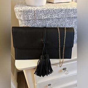 Black faux leather clutch bag w/tassel detail EUC